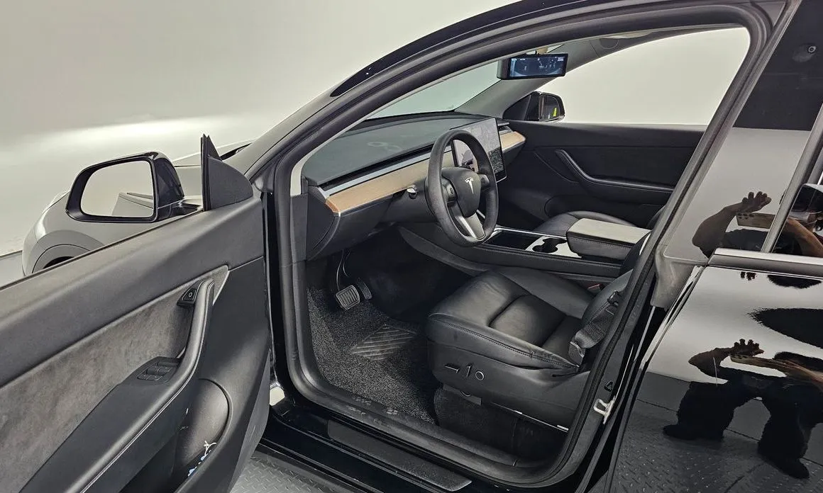 Tesla Model Y — фото 9