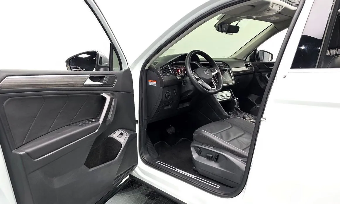 Volkswagen Tiguan — фото 9