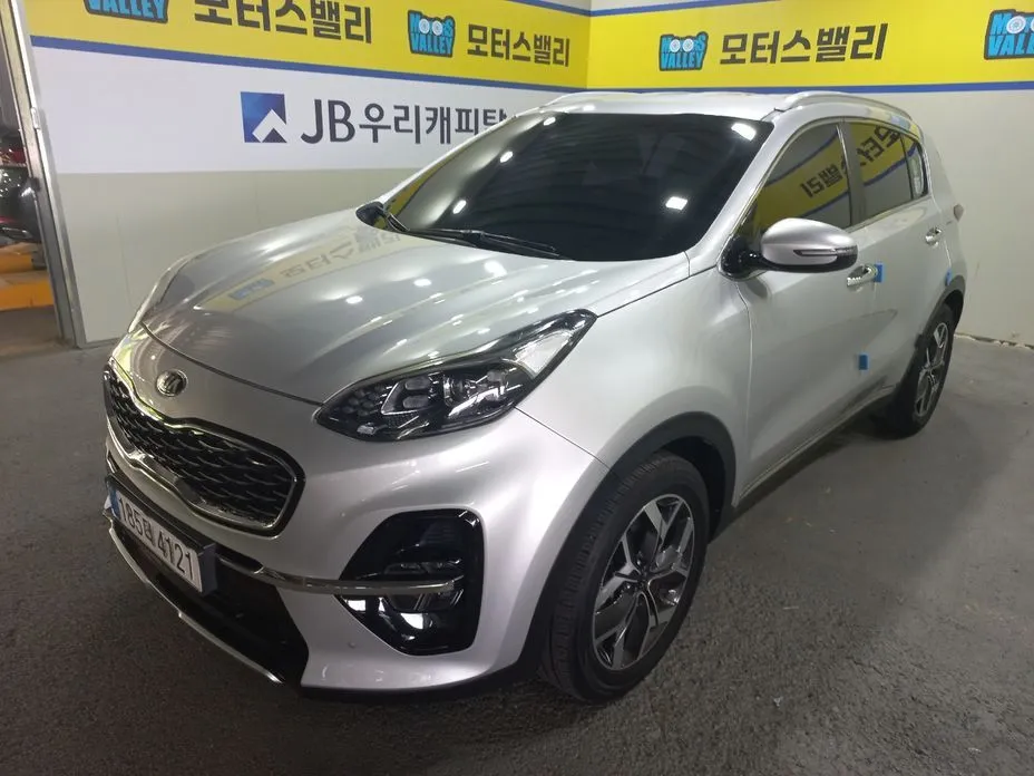 Kia Sportage — фото 1