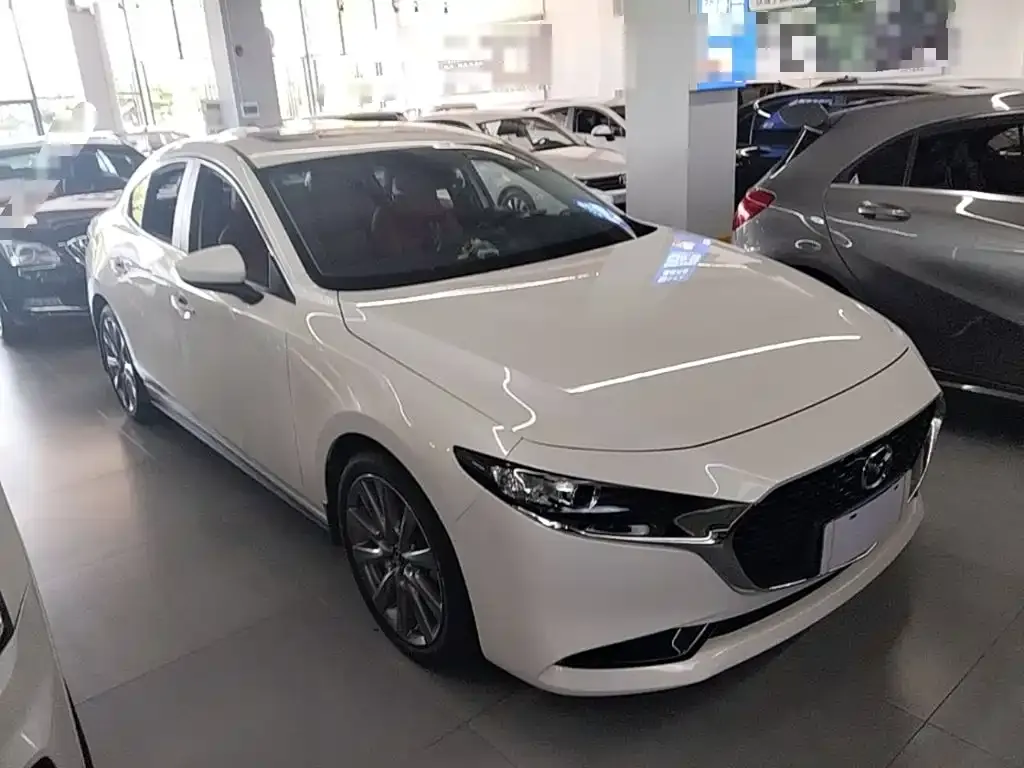 Mazda 3 Axela — фото 10