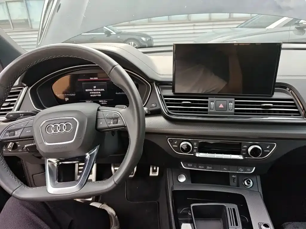 Audi Q5L — фото 10