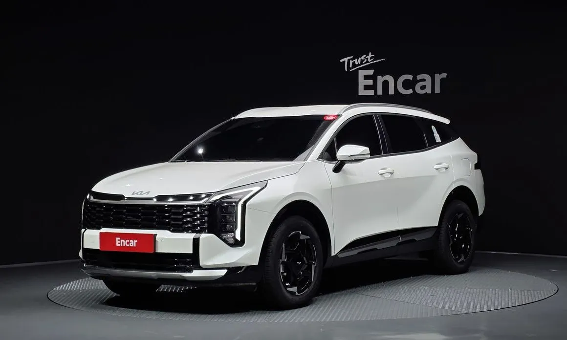 Kia Sportage — фото 1