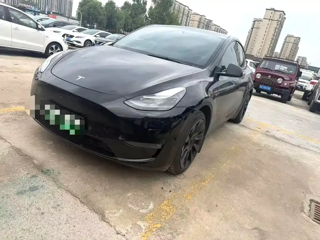 Tesla Model Y — фото 1