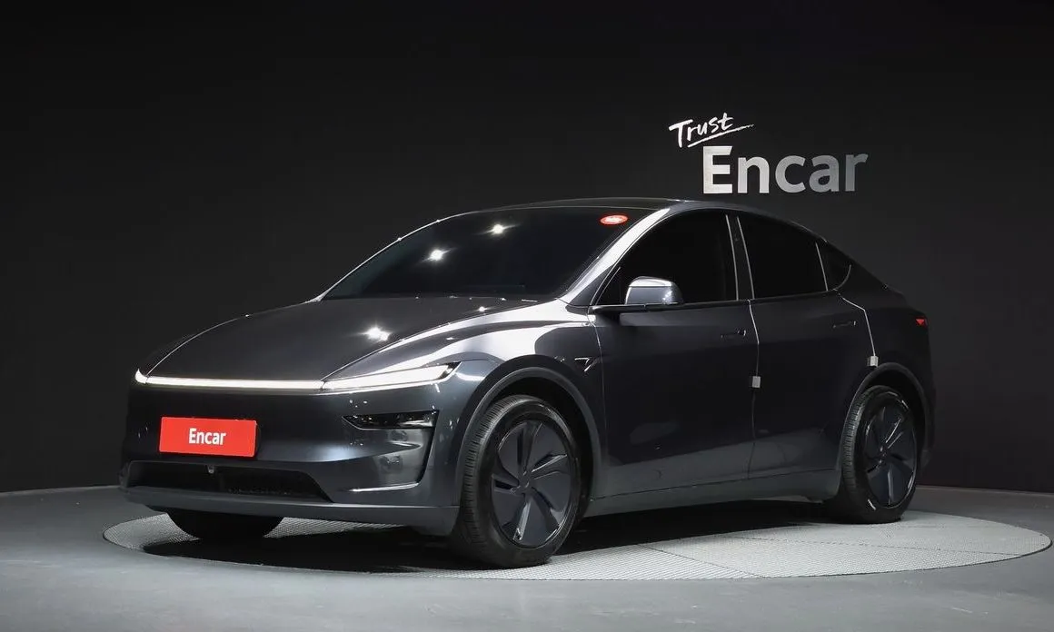Tesla Model Y — фото 1
