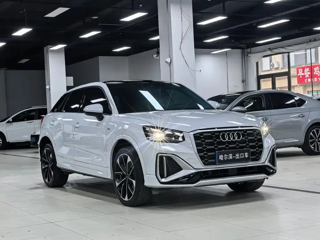 Audi Q2L — фото 10