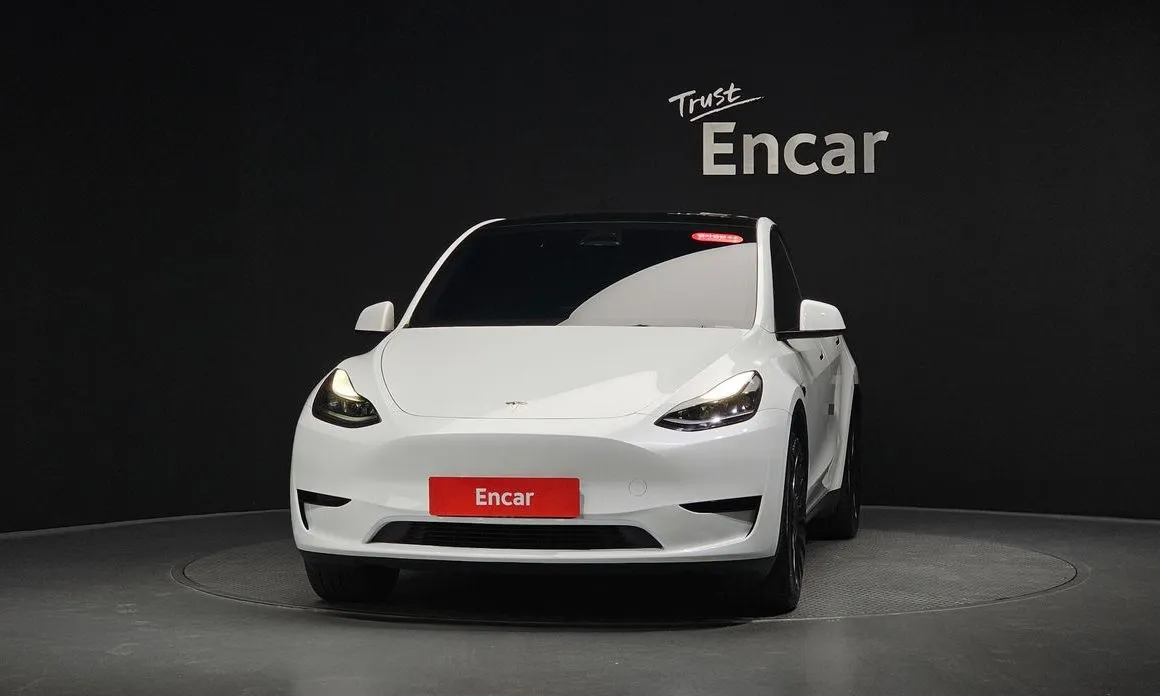 Tesla Model Y — фото 9