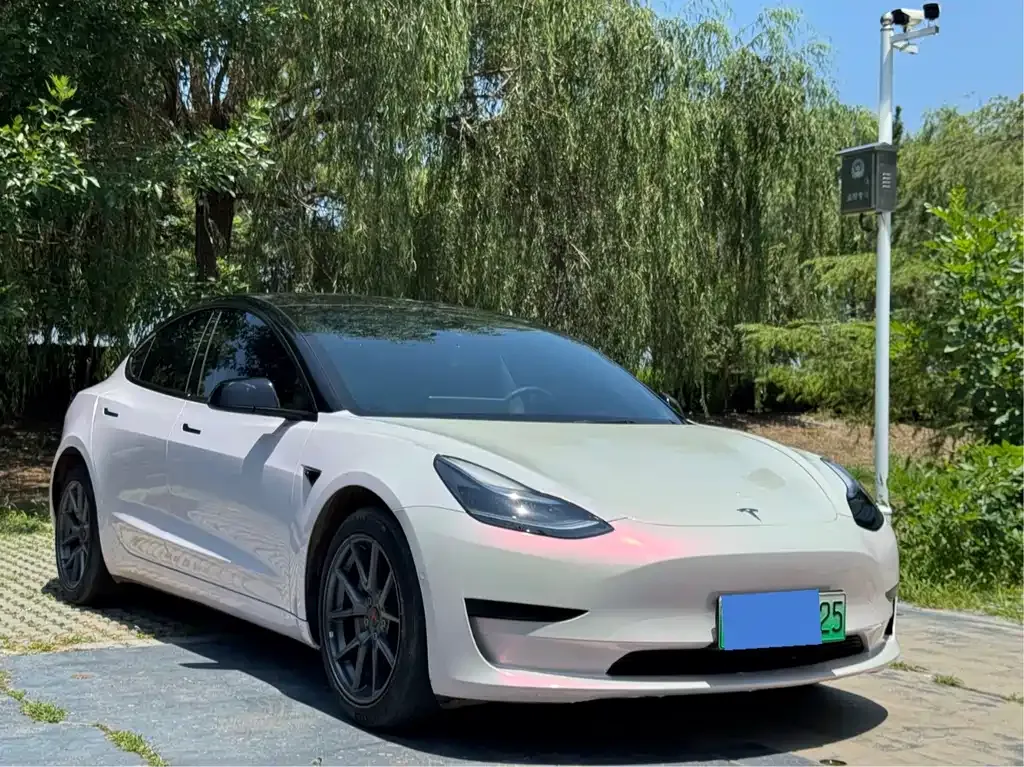 Tesla Model 3 — фото 10