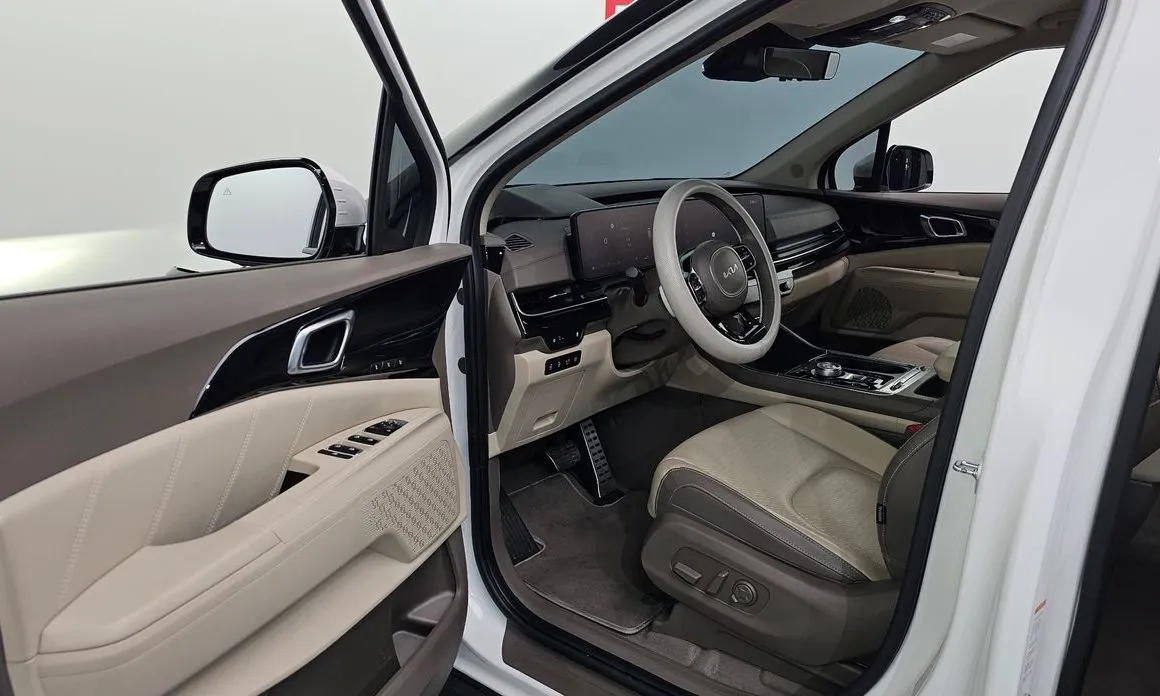 Kia Carnival — фото 10