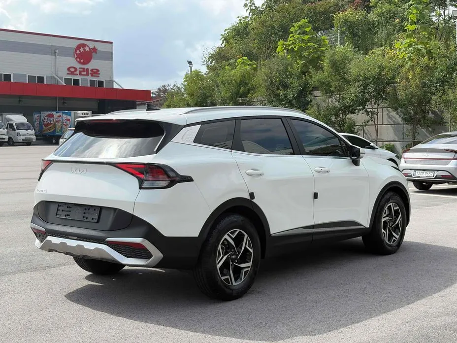 Kia Sportage — фото 8