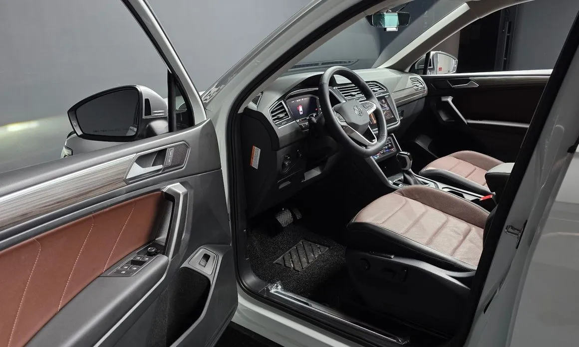 Volkswagen Tiguan — фото 6