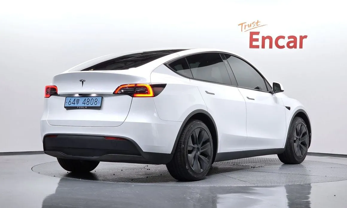 Tesla Model Y — фото 5