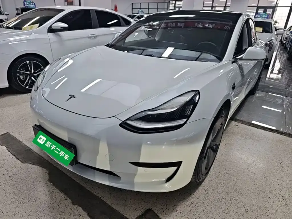 Tesla Model 3 — фото 7