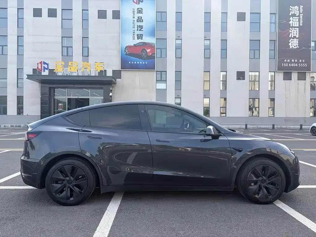 Tesla Model Y — фото 7