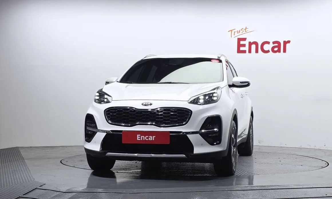 Kia Sportage — фото 10