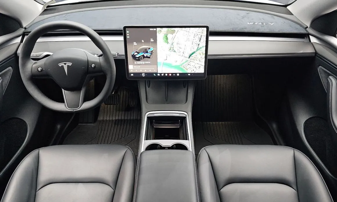 Tesla Model Y — фото 8
