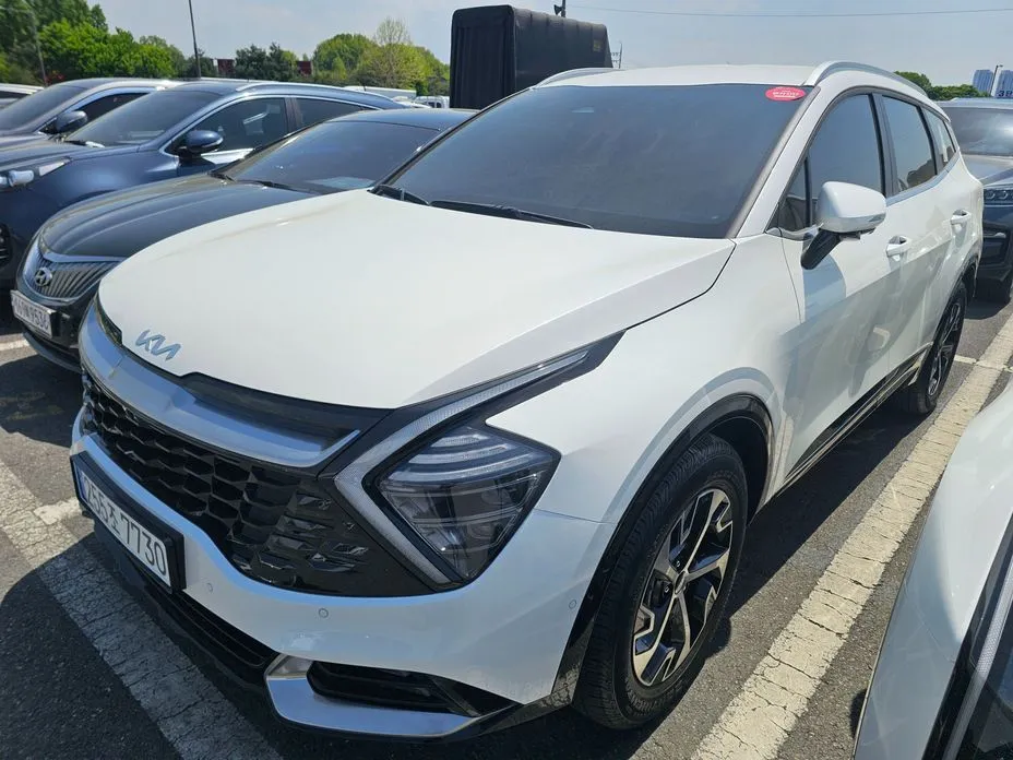 Kia Sportage — фото 1