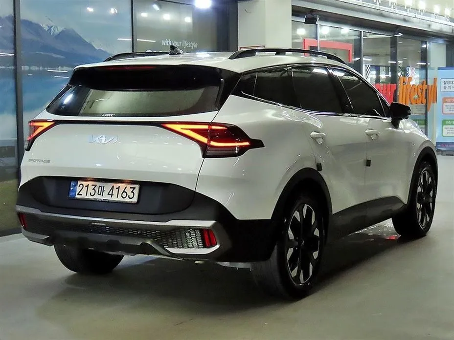 Kia Sportage — фото 9