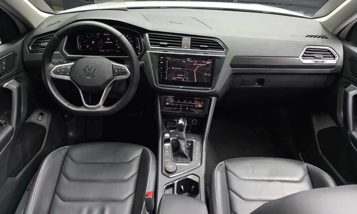 Volkswagen Tiguan — фото 9