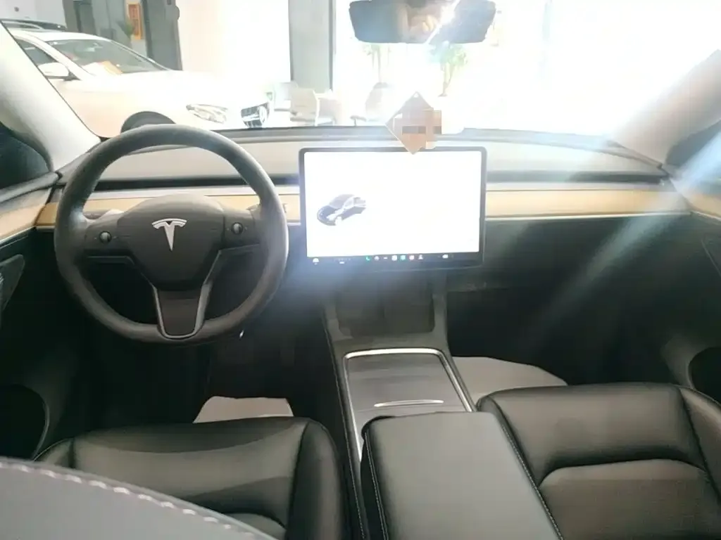 Tesla Model Y — фото 7