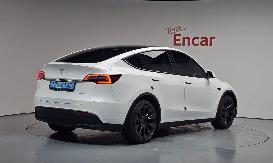 Tesla Model Y — фото 7