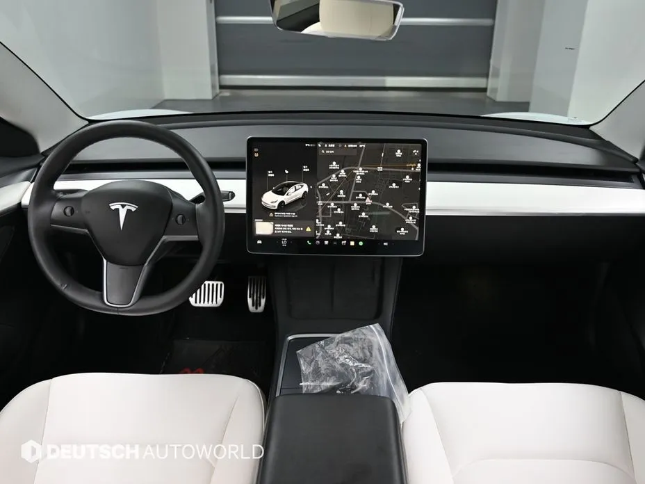 Tesla Model 3 — фото 7
