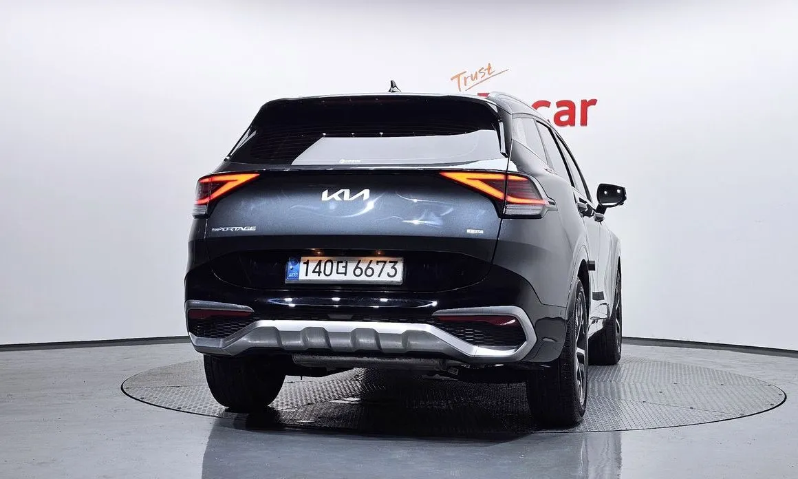 Kia Sportage — фото 9