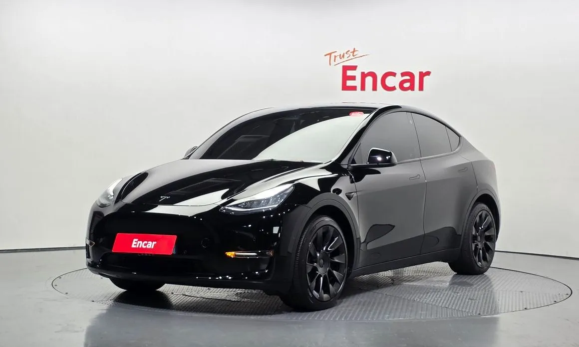 Tesla Model Y — фото 1