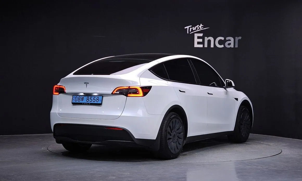 Tesla Model Y — фото 7