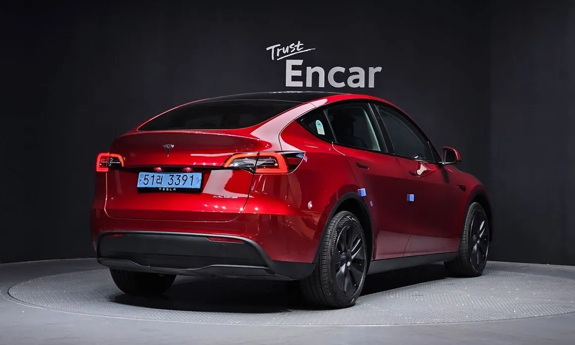 Tesla Model Y — фото 7