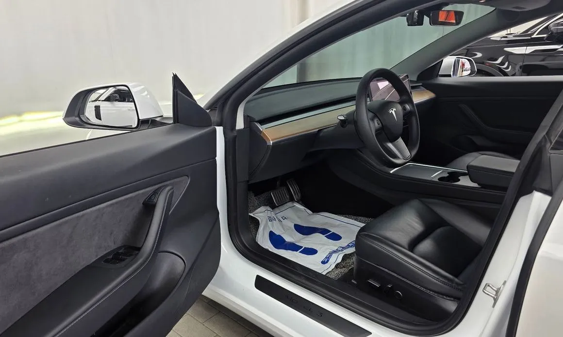 Tesla Model 3 — фото 10