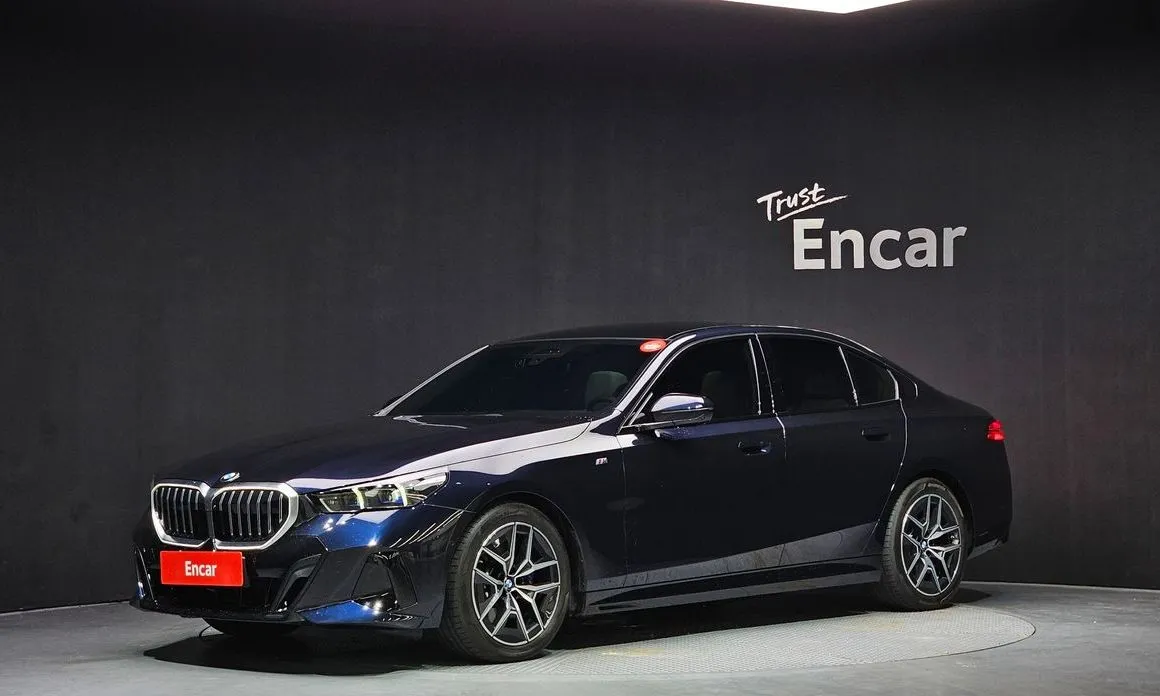 BMW 5-Series — фото 1