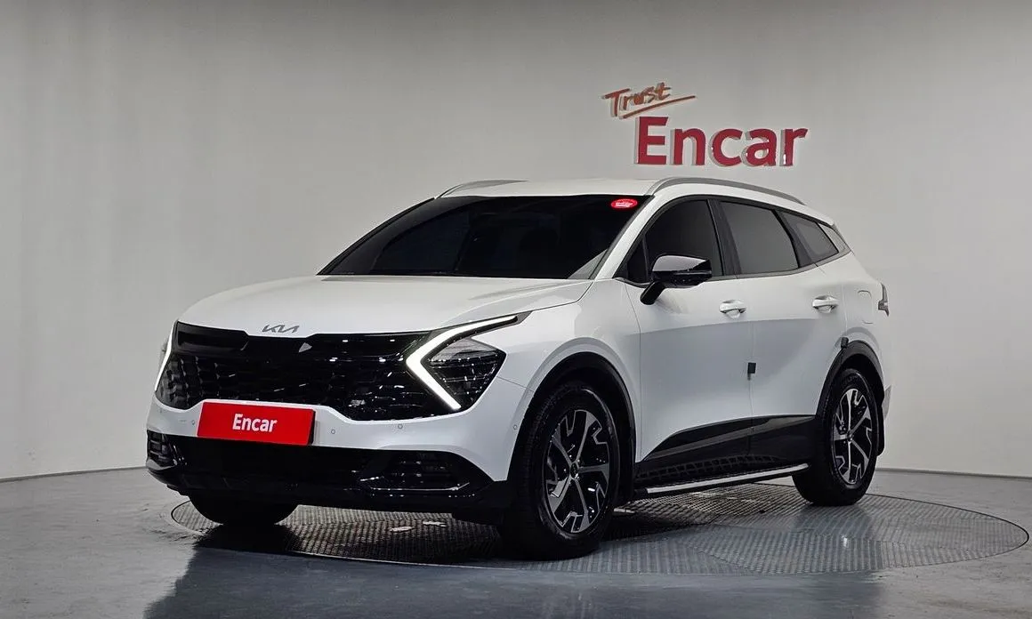 Kia Sportage — фото 1
