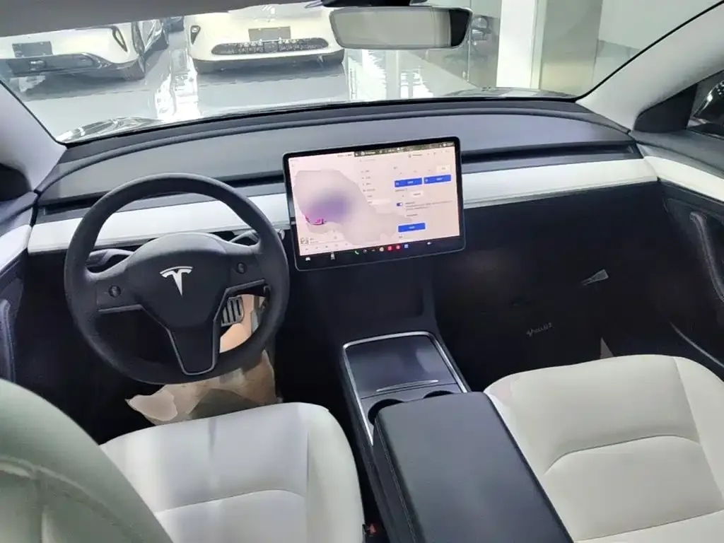 Tesla Model 3 — фото 7