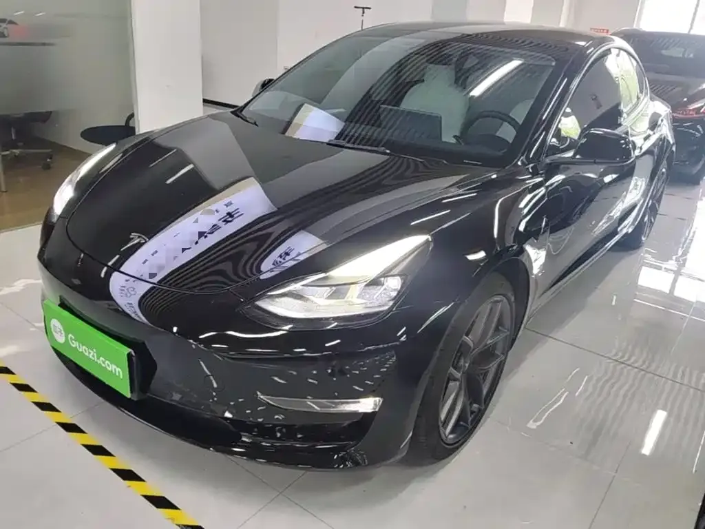 Tesla Model 3 — фото 10