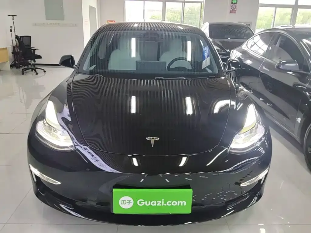 Tesla Model 3 — фото 9