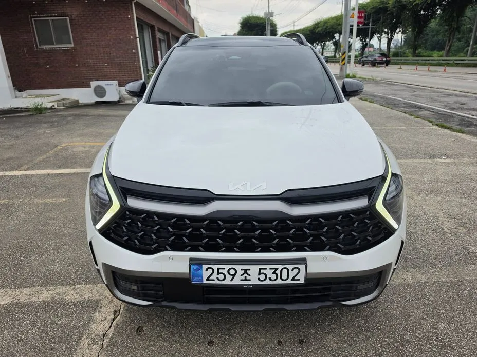 Kia Sportage — фото 1