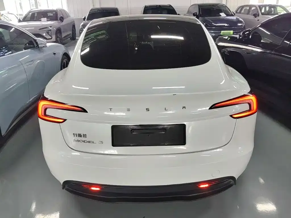 Tesla Model 3 — фото 6