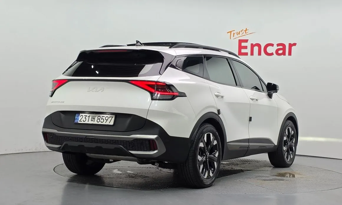 Kia Sportage — фото 9