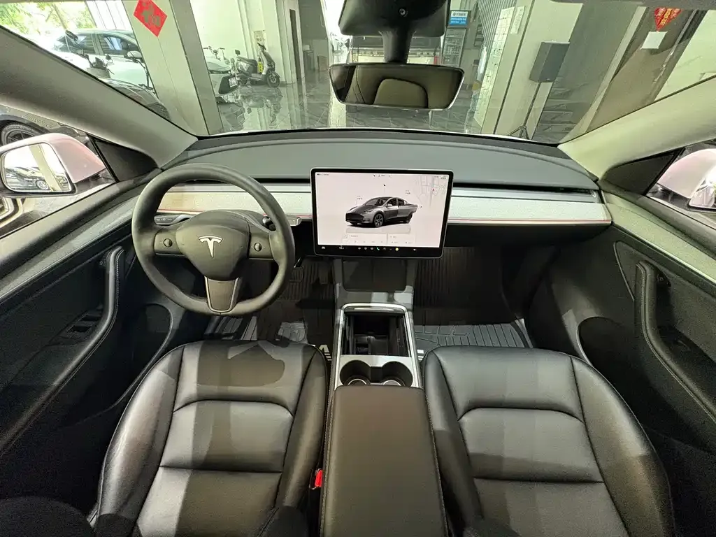Tesla Model Y — фото 10