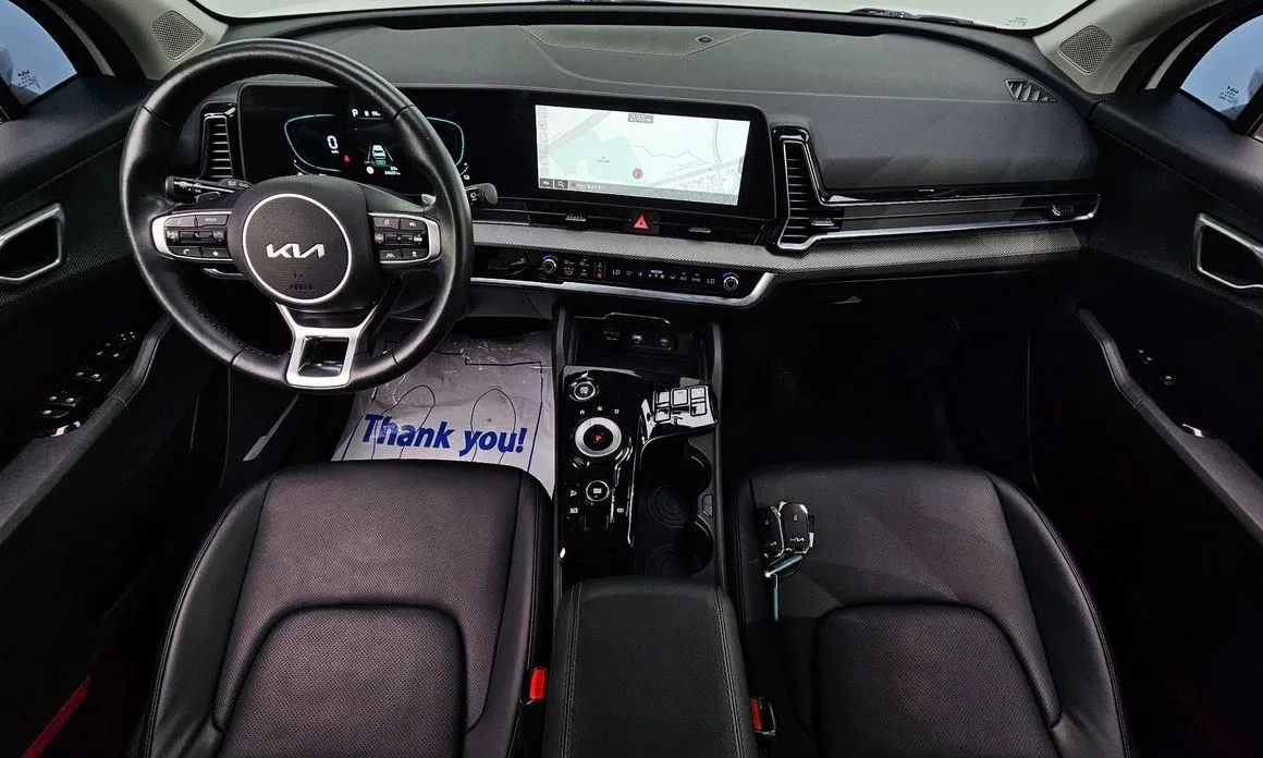 Kia Sportage — фото 8