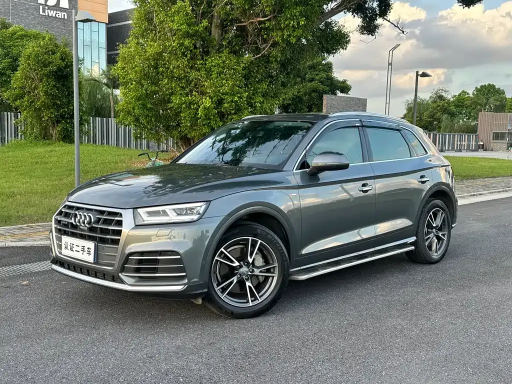Audi Q5L — фото 6