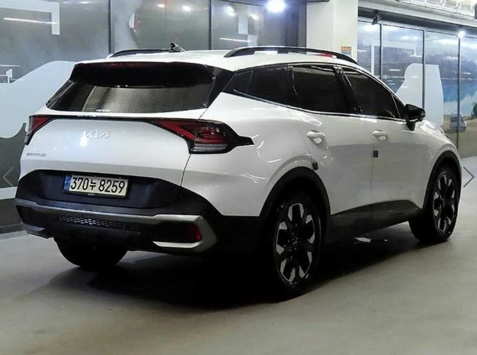Kia Sportage — фото 9