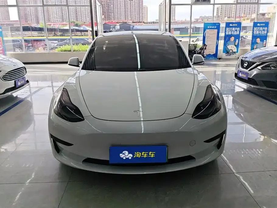 Tesla Model 3 — фото 10