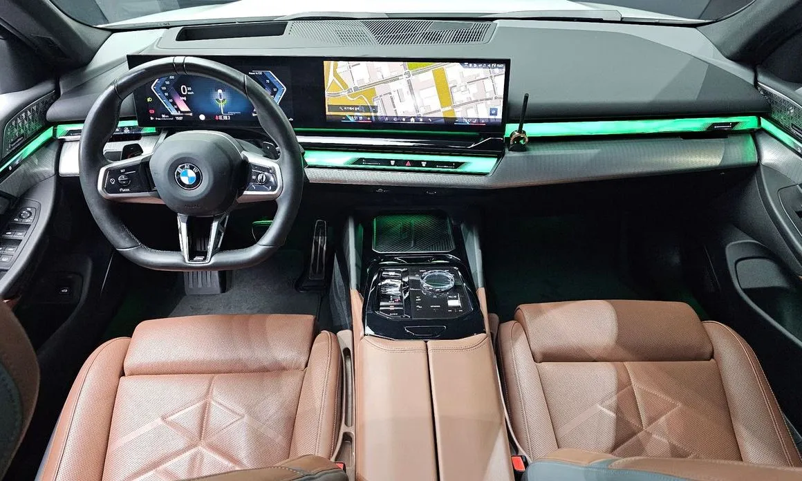 BMW 5-Series — фото 10