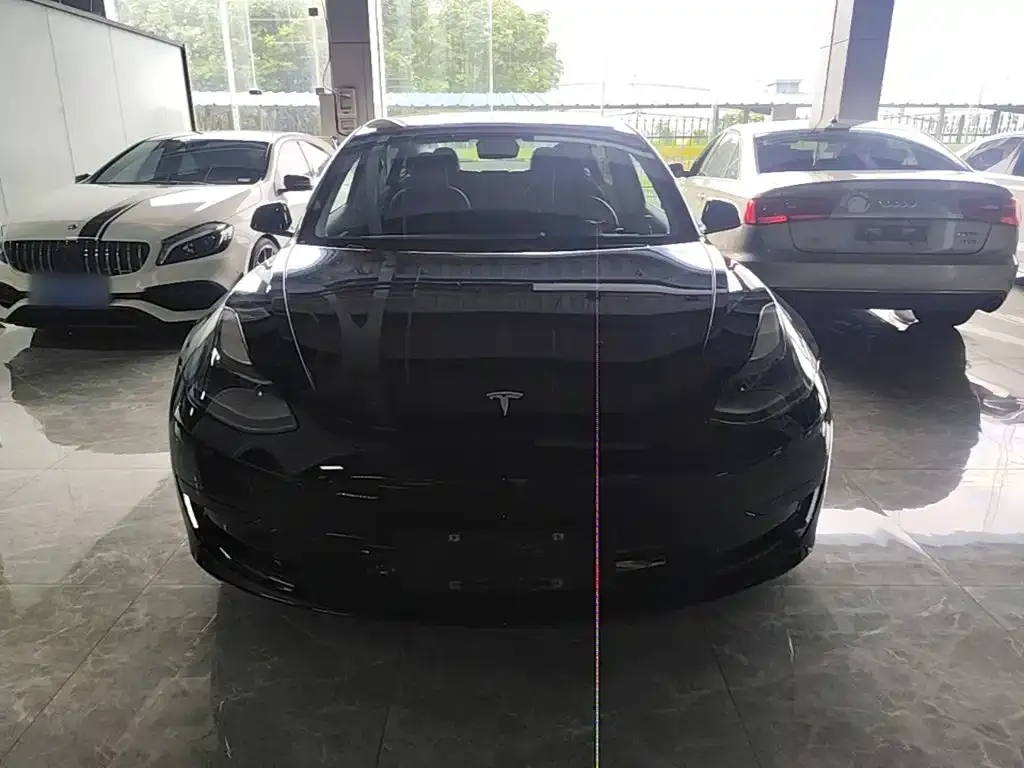 Tesla Model 3 — фото 5