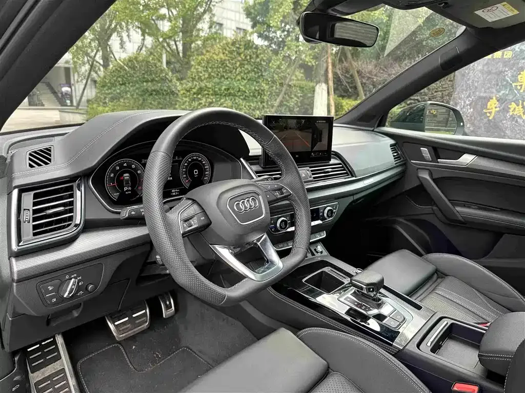 Audi Q5L — фото 6