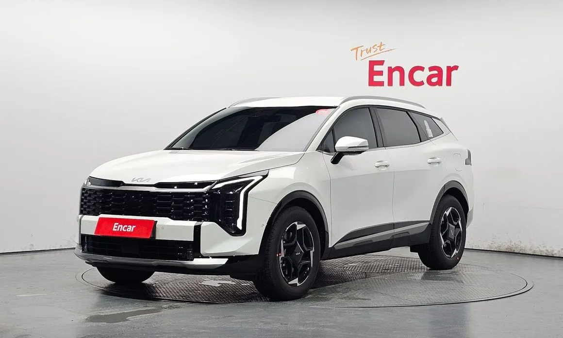 Kia Sportage — фото 1