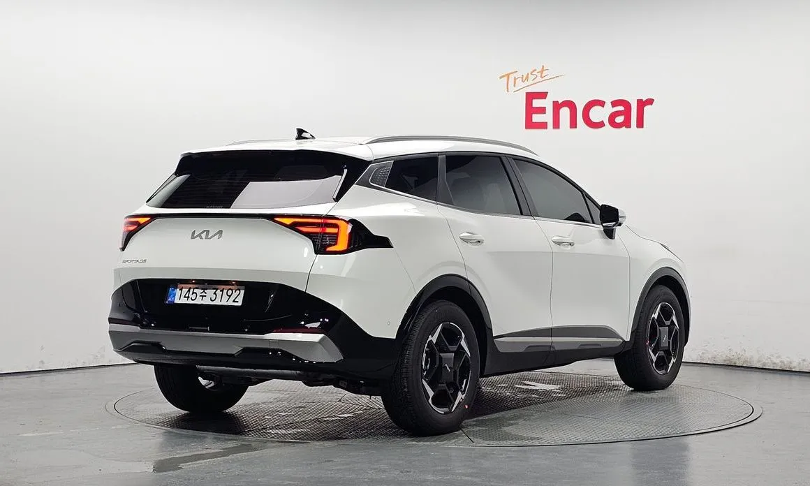 Kia Sportage — фото 8