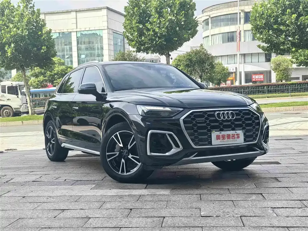Audi Q5L — фото 5