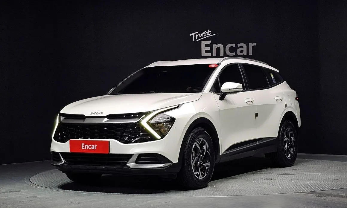 Kia Sportage — фото 1